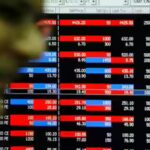 Sensex slides 1k points on oil surge, Rupee fall