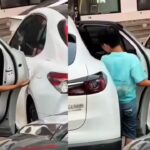 Child opens car door carefully to avoid scratches, a simple moment that reveals powerful parenting |