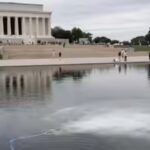 America@250 swathed in red, white, and blue — and green algae